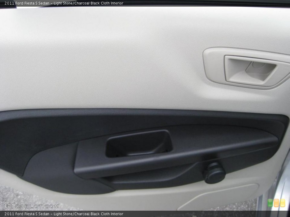 Light Stone/Charcoal Black Cloth Interior Door Panel for the 2011 Ford Fiesta S Sedan #39937380