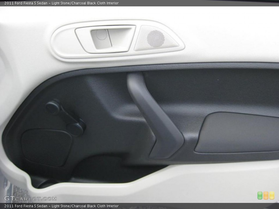 Light Stone/Charcoal Black Cloth Interior Door Panel for the 2011 Ford Fiesta S Sedan #39937420