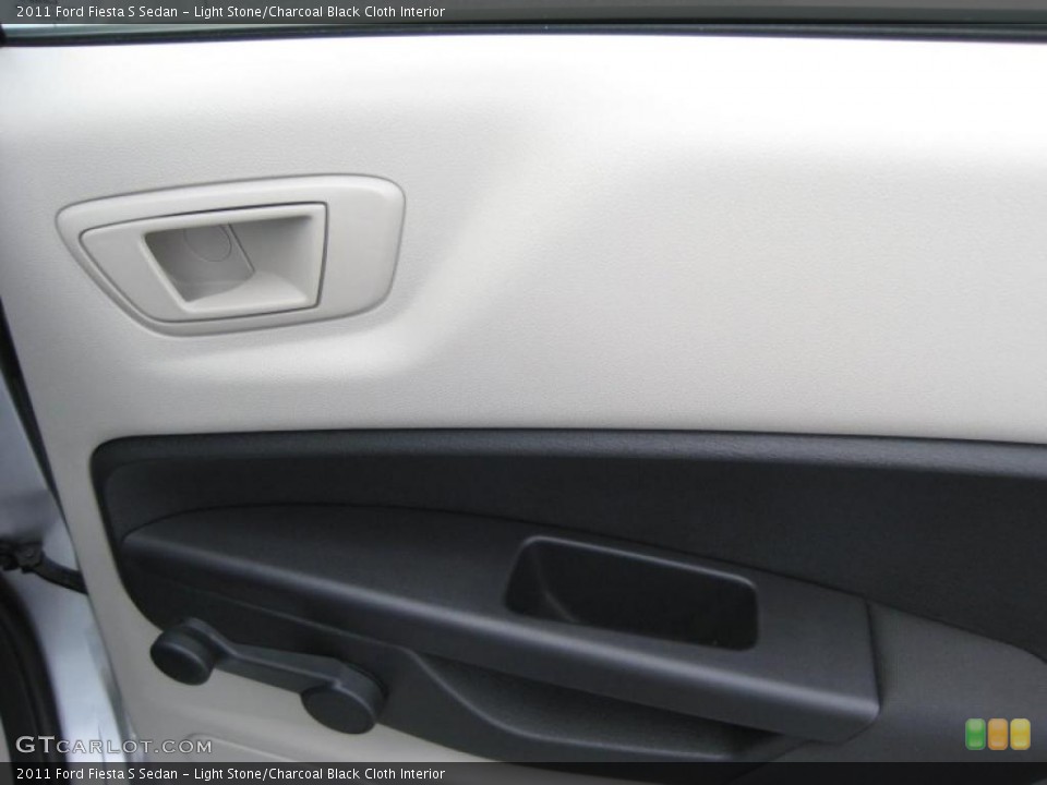 Light Stone/Charcoal Black Cloth Interior Door Panel for the 2011 Ford Fiesta S Sedan #39937464