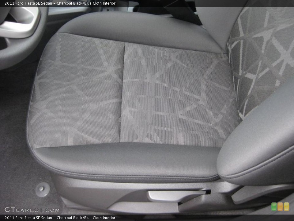 Charcoal Black/Blue Cloth Interior Photo for the 2011 Ford Fiesta SE Sedan #39937752