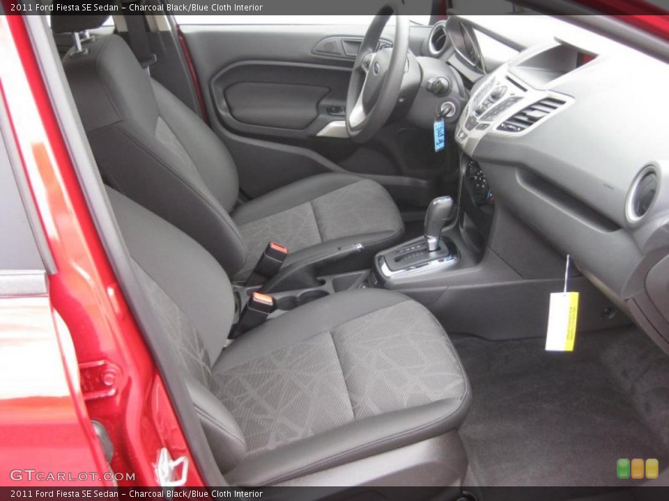 Charcoal Black/Blue Cloth Interior Dashboard for the 2011 Ford Fiesta SE Sedan #39937832