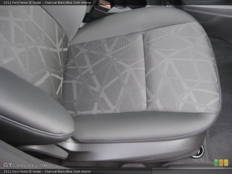 Charcoal Black/Blue Cloth Interior Photo for the 2011 Ford Fiesta SE Sedan #39937844