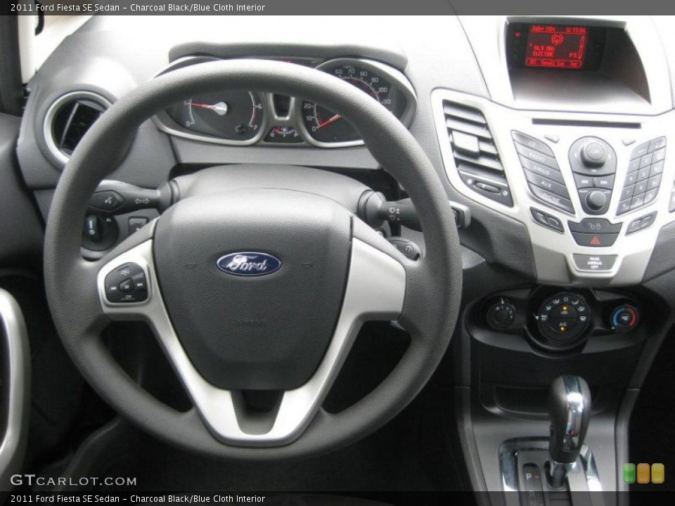 Charcoal Black/Blue Cloth Interior Dashboard for the 2011 Ford Fiesta SE Sedan #39937924