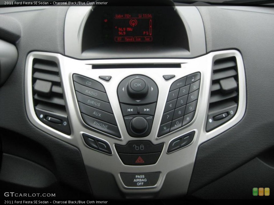Charcoal Black/Blue Cloth Interior Controls for the 2011 Ford Fiesta SE Sedan #39937940