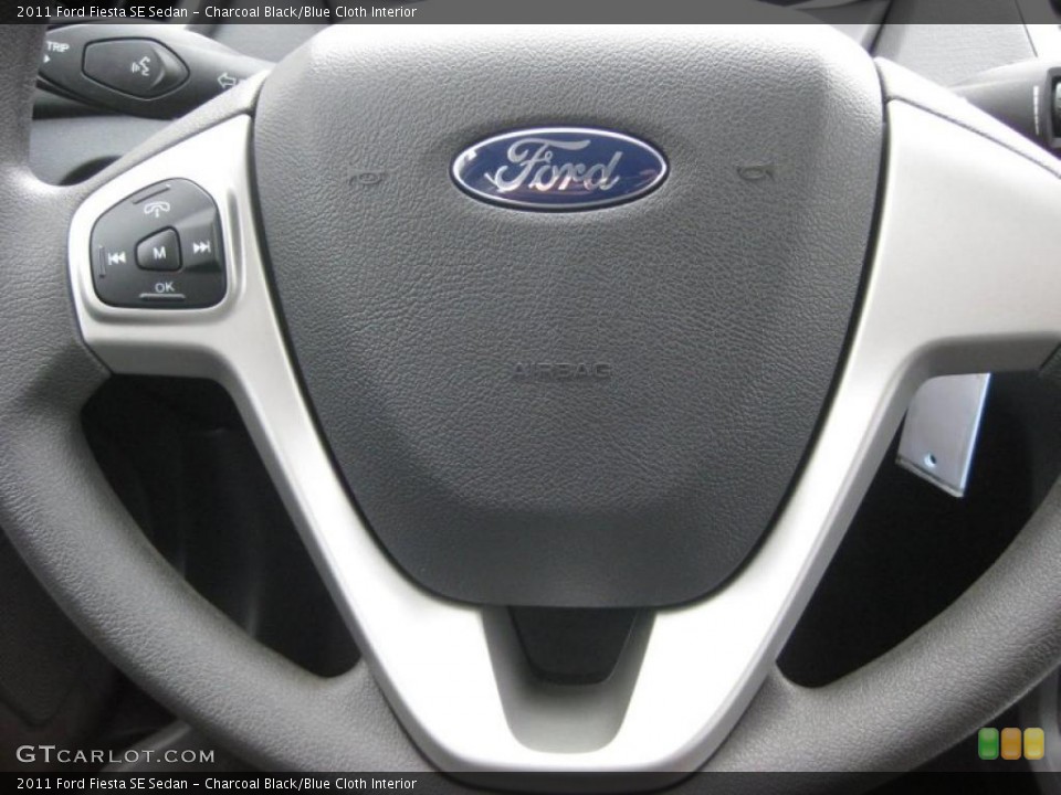 Charcoal Black/Blue Cloth Interior Controls for the 2011 Ford Fiesta SE Sedan #39937988