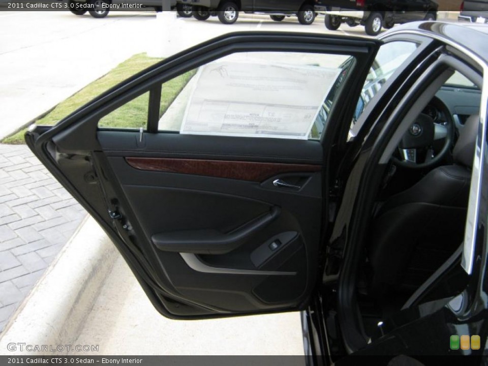 Ebony Interior Door Panel for the 2011 Cadillac CTS 3.0 Sedan #39970700