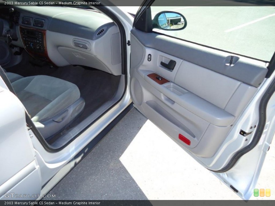 Medium Graphite Interior Door Panel for the 2003 Mercury Sable GS Sedan #39970936