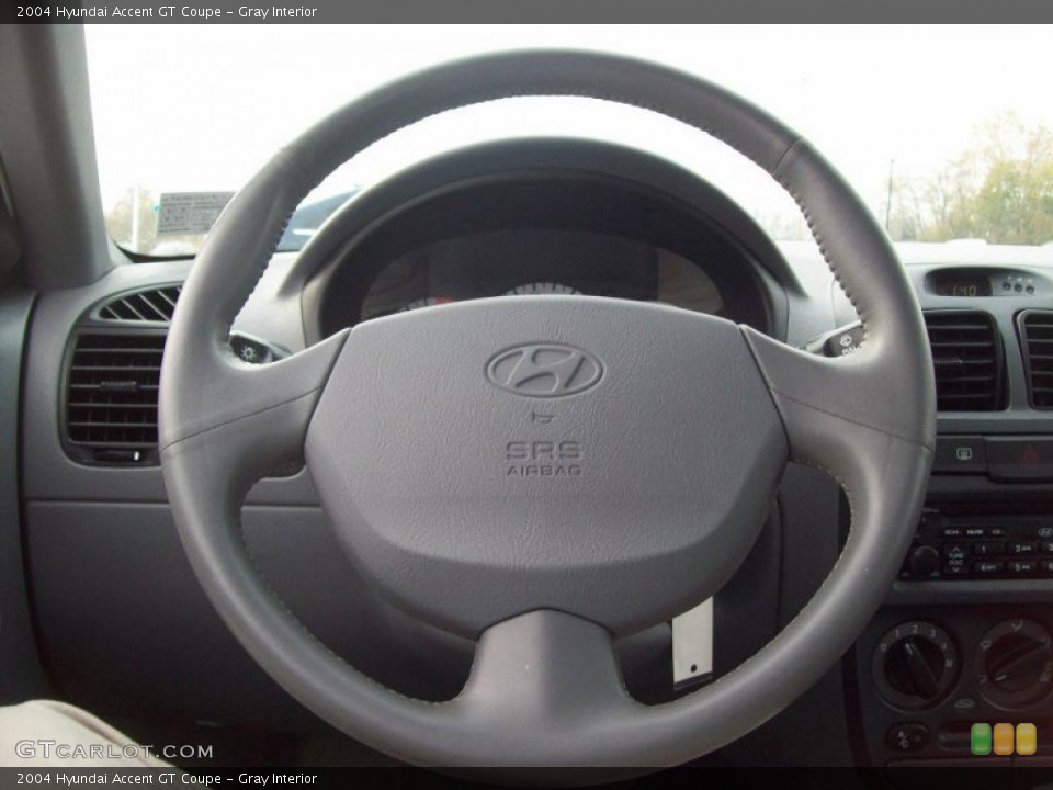 Gray Interior Steering Wheel for the 2004 Hyundai Accent GT Coupe #39995156