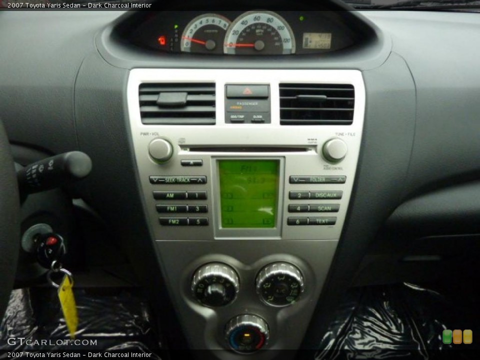 Dark Charcoal Interior Controls for the 2007 Toyota Yaris Sedan #40021382