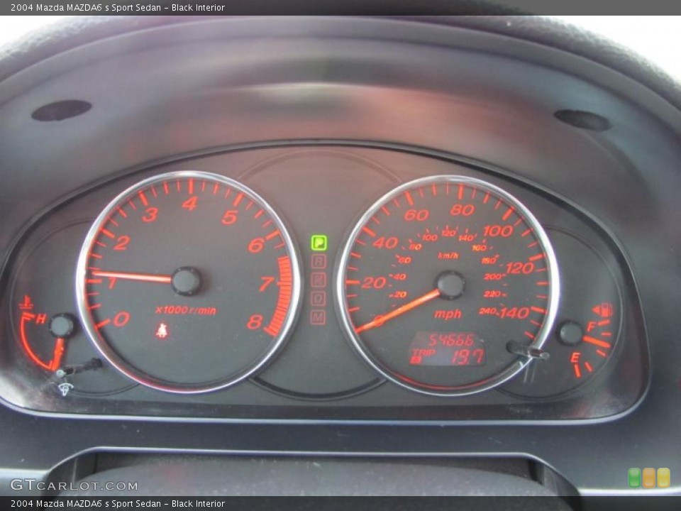 Black Interior Gauges for the 2004 Mazda MAZDA6 s Sport Sedan #40054836
