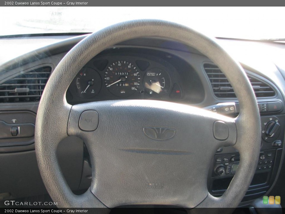 Gray Interior Steering Wheel for the 2002 Daewoo Lanos Sport Coupe #40059163