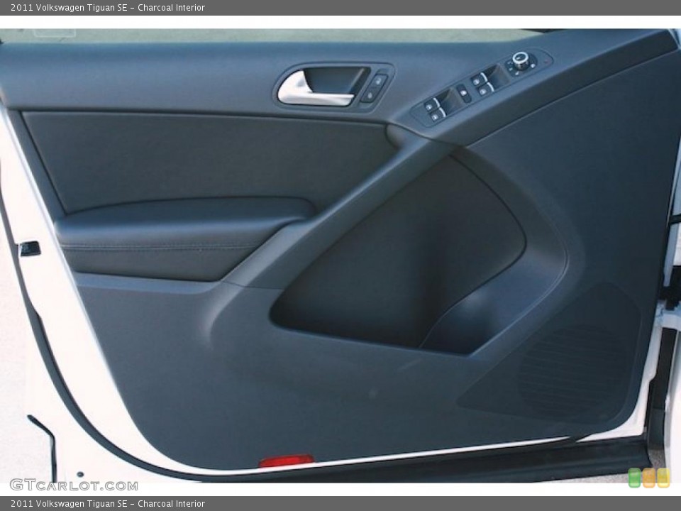 Charcoal Interior Door Panel for the 2011 Volkswagen Tiguan SE #40059711