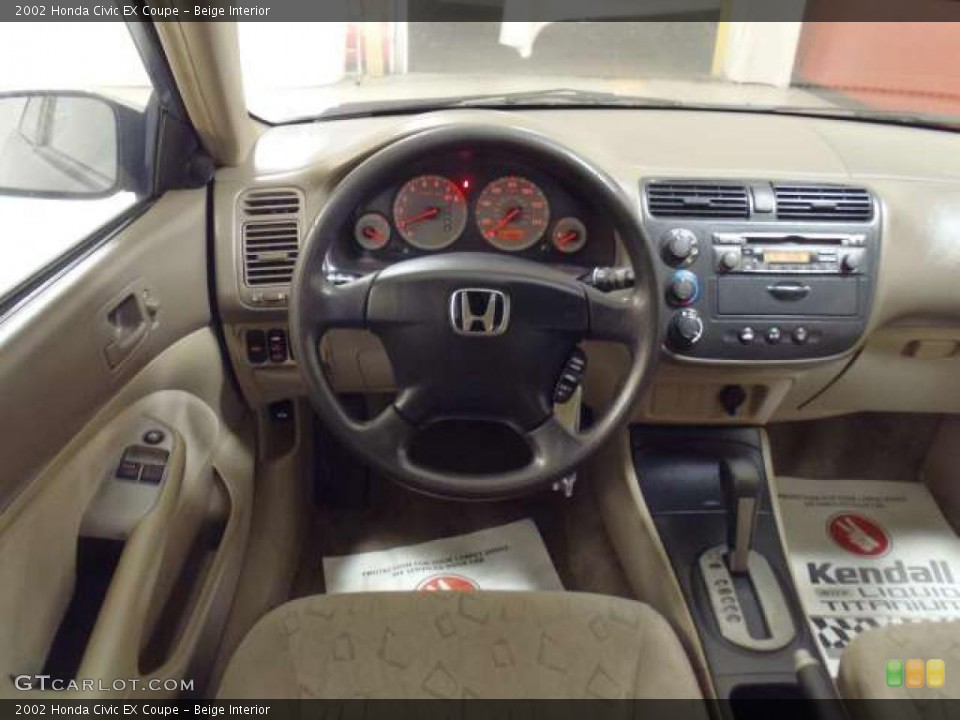 Beige Interior Dashboard for the 2002 Honda Civic EX Coupe #40066923