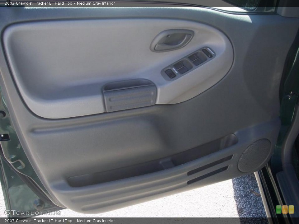 Medium Gray Interior Door Panel for the 2003 Chevrolet Tracker LT Hard Top #40105791