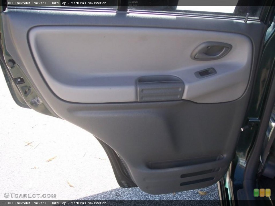 Medium Gray Interior Door Panel for the 2003 Chevrolet Tracker LT Hard Top #40105815