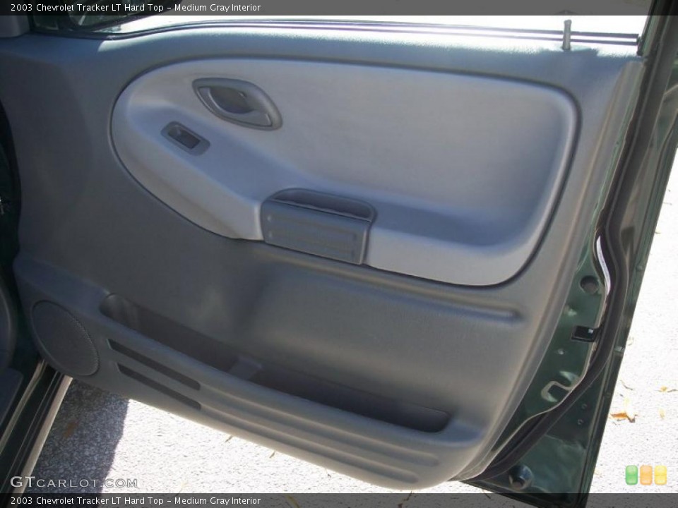 Medium Gray Interior Door Panel for the 2003 Chevrolet Tracker LT Hard Top #40105828