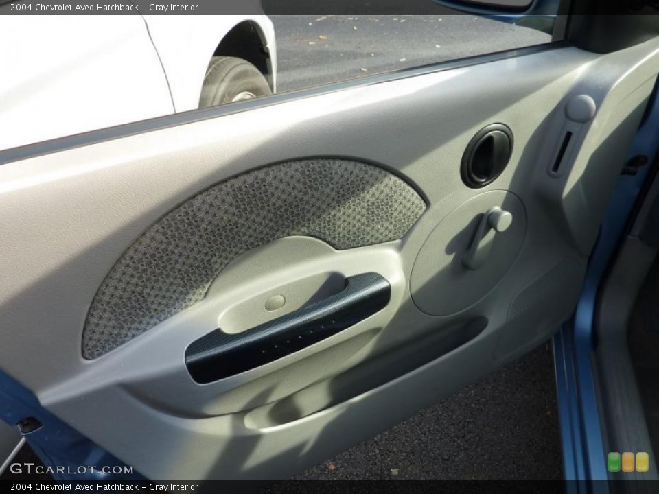 Gray Interior Door Panel for the 2004 Chevrolet Aveo Hatchback #40107867