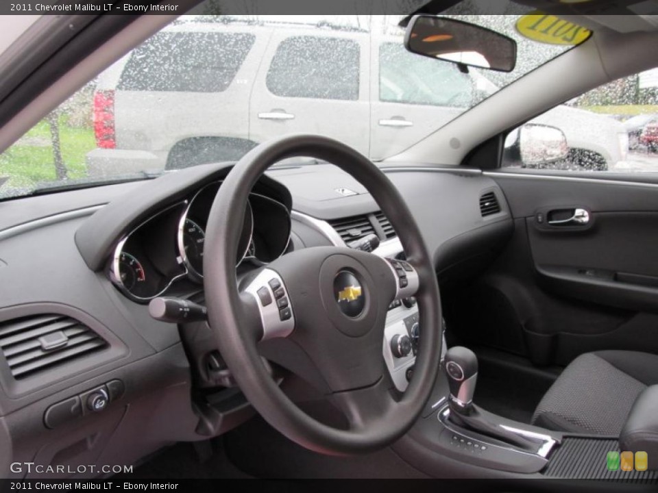 Ebony Interior Dashboard for the 2011 Chevrolet Malibu LT #40126384