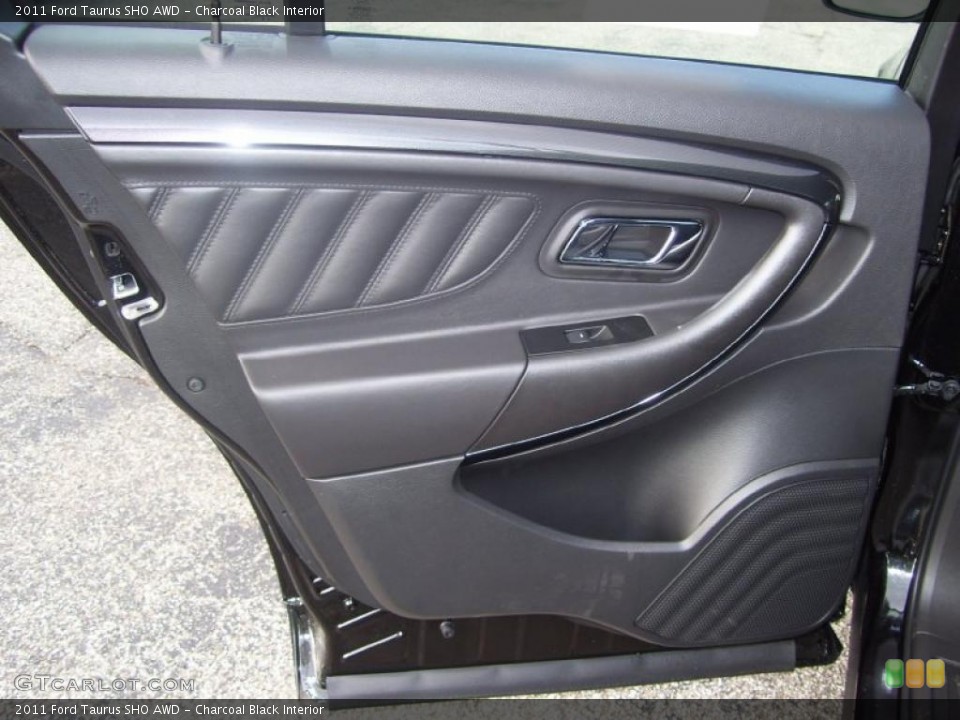 Charcoal Black Interior Door Panel for the 2011 Ford Taurus SHO AWD #40159621