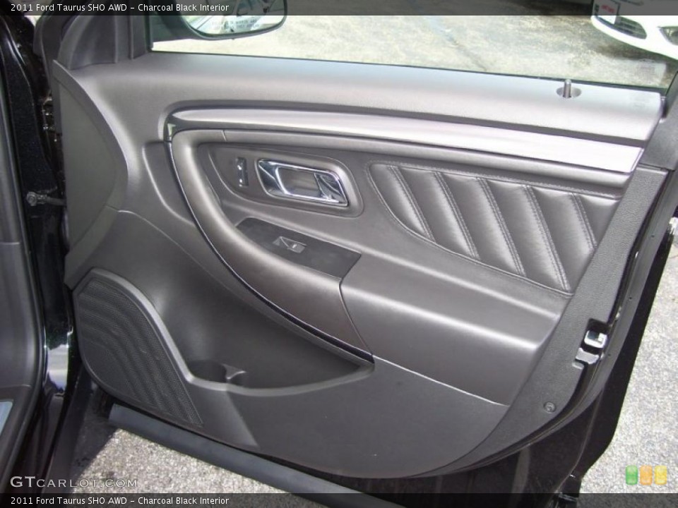 Charcoal Black Interior Door Panel for the 2011 Ford Taurus SHO AWD #40159633