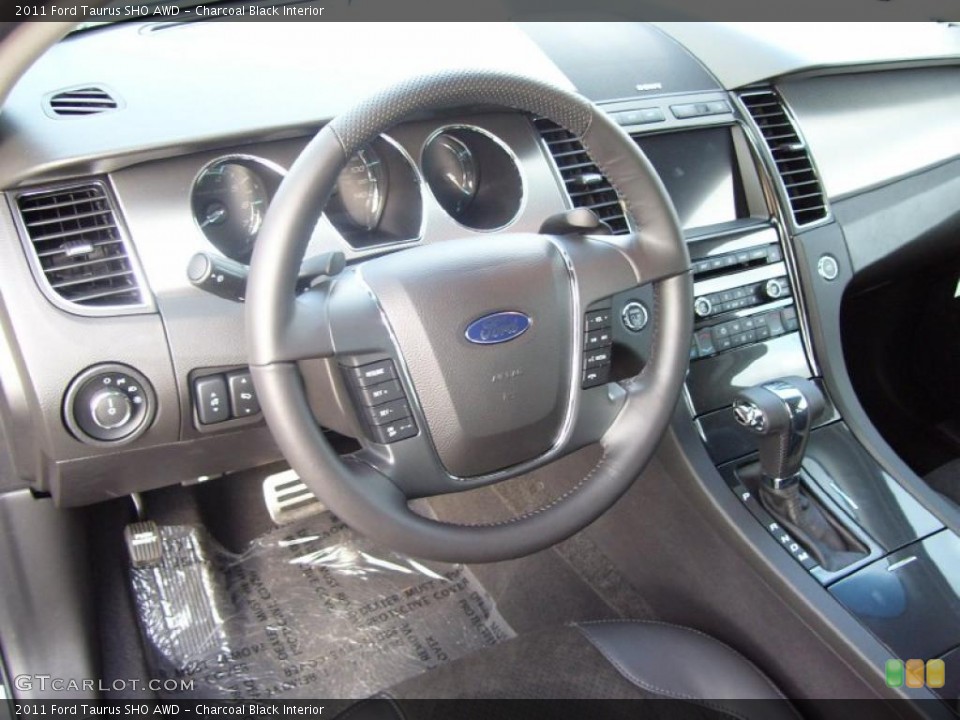 Charcoal Black Interior Prime Interior for the 2011 Ford Taurus SHO AWD #40159681