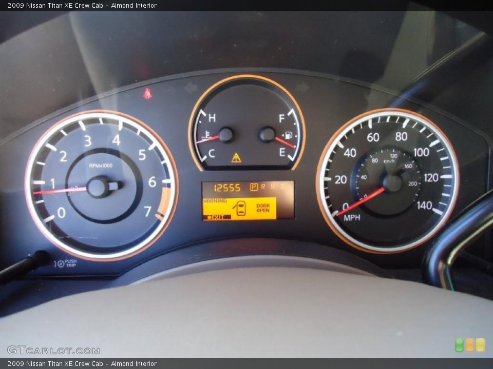 Almond Interior Gauges for the 2009 Nissan Titan XE Crew Cab #40161377