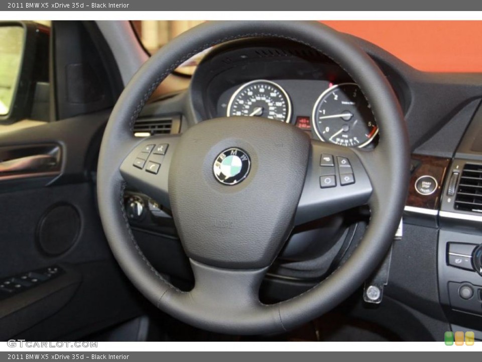 Black Interior Steering Wheel for the 2011 BMW X5 xDrive 35d #40178534