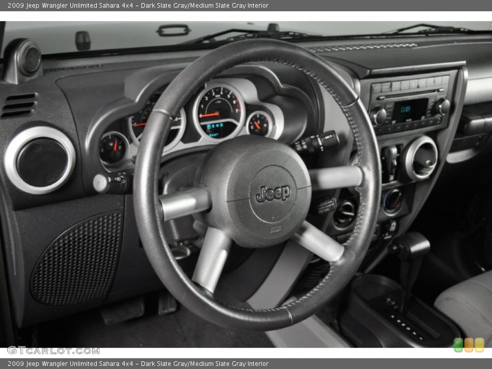 Dark Slate Gray/Medium Slate Gray Interior Dashboard for the 2009 Jeep Wrangler Unlimited Sahara 4x4 #40190207