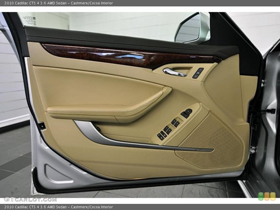 Cashmere/Cocoa Interior Door Panel for the 2010 Cadillac CTS 4 3.6 AWD Sedan #40196735