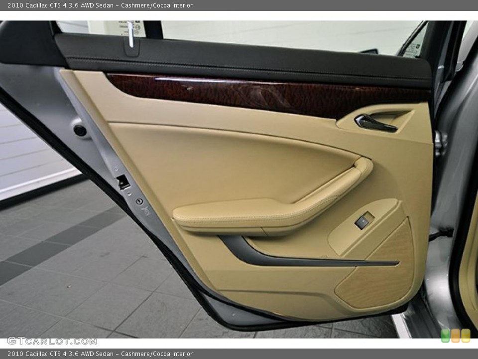 Cashmere/Cocoa Interior Door Panel for the 2010 Cadillac CTS 4 3.6 AWD Sedan #40196767