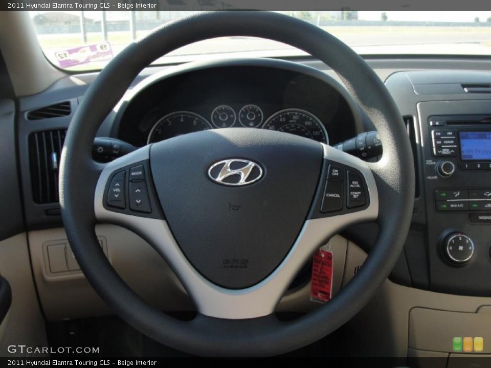 Beige Interior Steering Wheel for the 2011 Hyundai Elantra Touring GLS #40199576