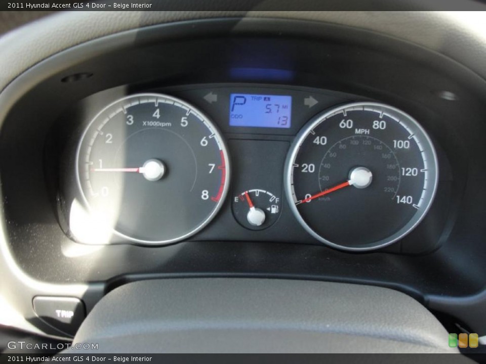 Beige Interior Gauges for the 2011 Hyundai Accent GLS 4 Door #40202548