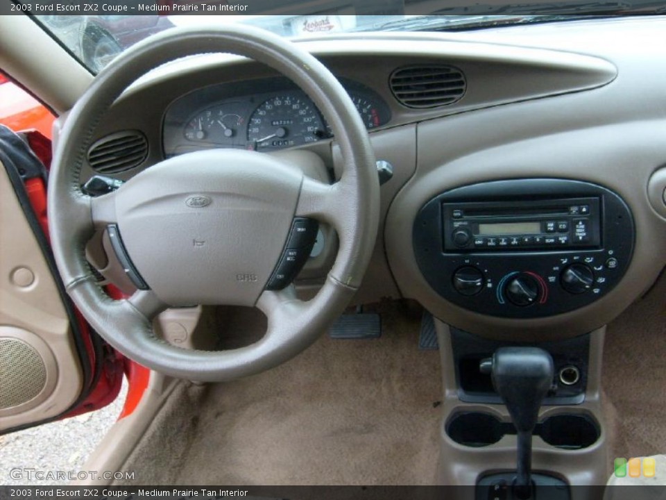 Medium Prairie Tan Interior Dashboard for the 2003 Ford Escort ZX2 Coupe #40249690