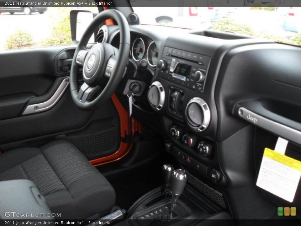 Black Interior Dashboard for the 2011 Jeep Wrangler Unlimited Rubicon 4x4 #40257894
