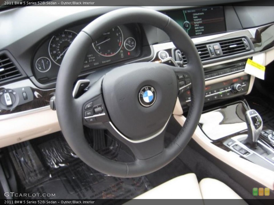 Oyster/Black Interior Dashboard for the 2011 BMW 5 Series 528i Sedan #40279894