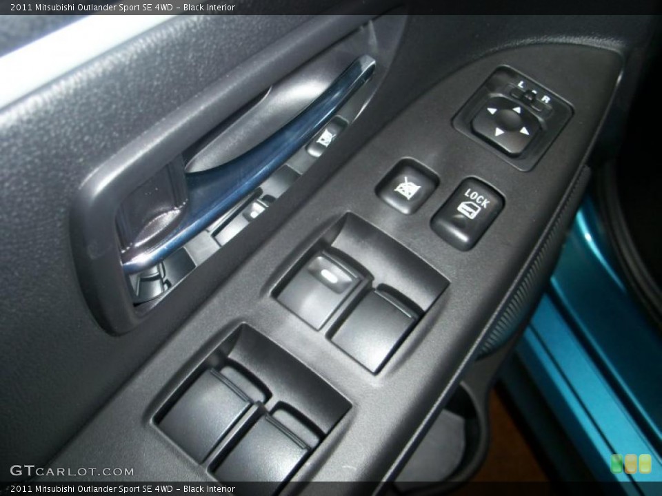 Black Interior Controls for the 2011 Mitsubishi Outlander Sport SE 4WD #40329609