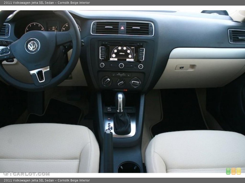 Cornsilk Beige Interior Dashboard for the 2011 Volkswagen Jetta SEL Sedan #40351234