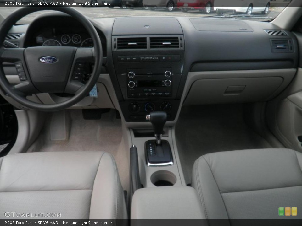 Medium Light Stone Interior Dashboard for the 2008 Ford Fusion SE V6 AWD #40359589