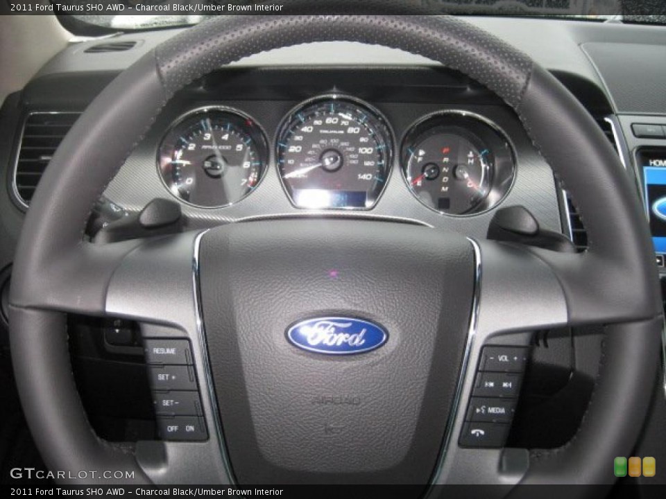 Charcoal Black/Umber Brown Interior Steering Wheel for the 2011 Ford Taurus SHO AWD #40367405