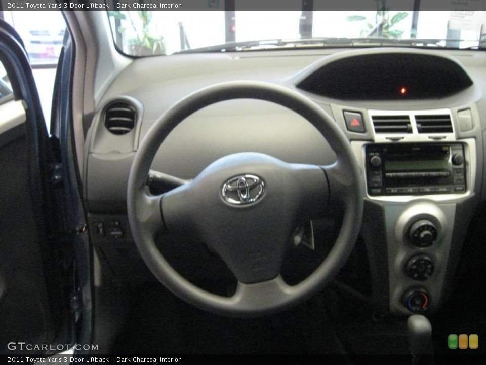 Dark Charcoal Interior Dashboard for the 2011 Toyota Yaris 3 Door Liftback #40376509