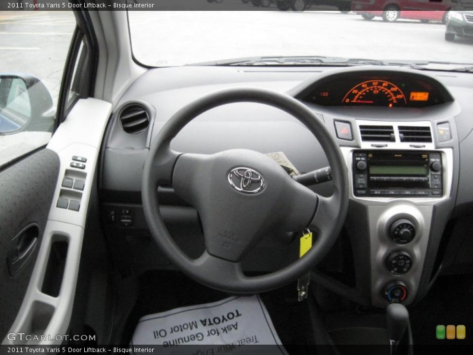 Bisque Interior Steering Wheel for the 2011 Toyota Yaris 5 Door Liftback #40376657