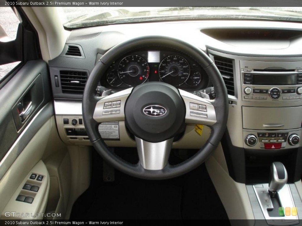 Warm Ivory Interior Steering Wheel for the 2010 Subaru Outback 2.5i Premium Wagon #40383469