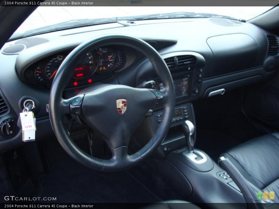 Black Interior Dashboard for the 2004 Porsche 911 Carrera 4S Coupe #40397725