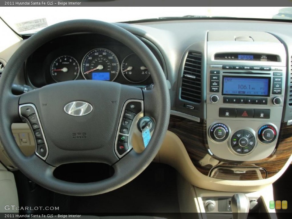 Beige Interior Dashboard for the 2011 Hyundai Santa Fe GLS #40401993