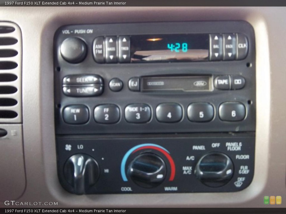 Medium Prairie Tan Interior Controls for the 1997 Ford F150 XLT Extended Cab 4x4 #40404217