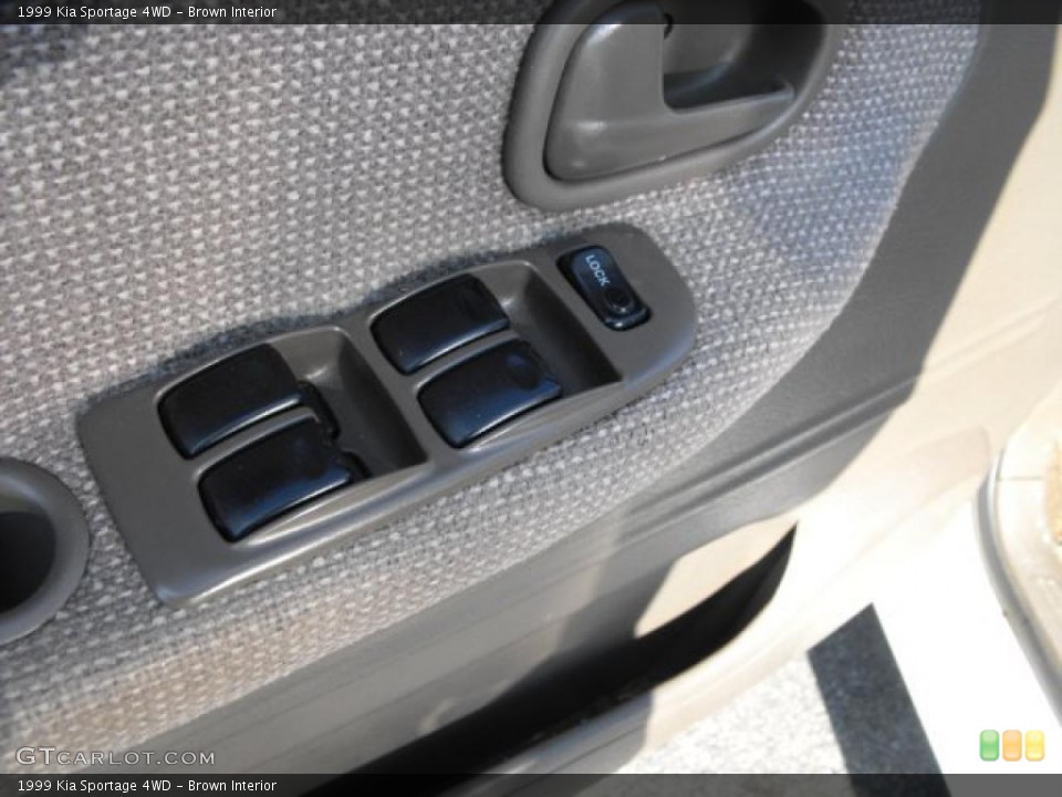 Brown Interior Controls for the 1999 Kia Sportage 4WD #40443713