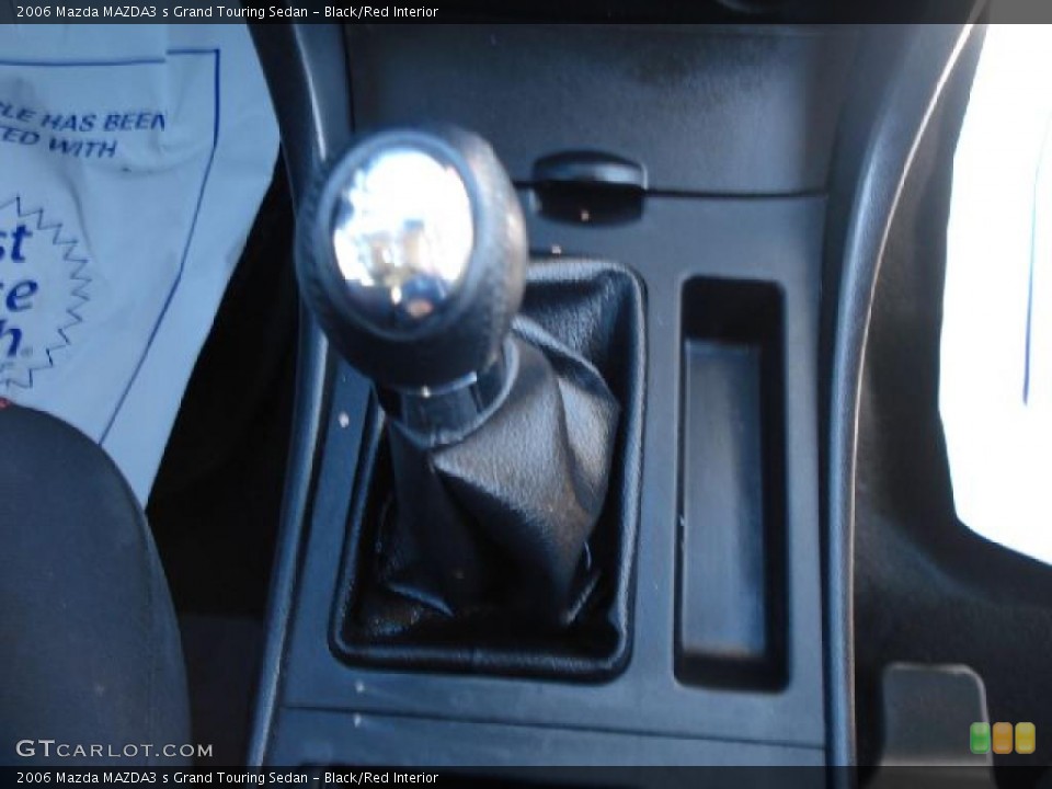 Black/Red Interior Transmission for the 2006 Mazda MAZDA3 s Grand Touring Sedan #40463903