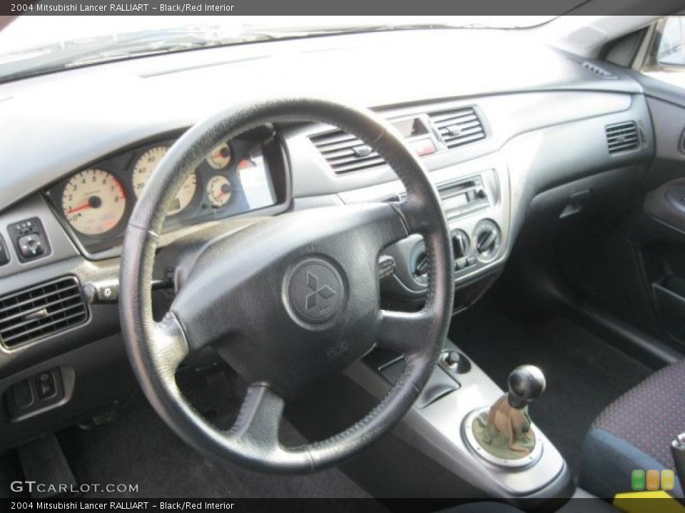 Black/Red Interior Photo for the 2004 Mitsubishi Lancer RALLIART #40507590