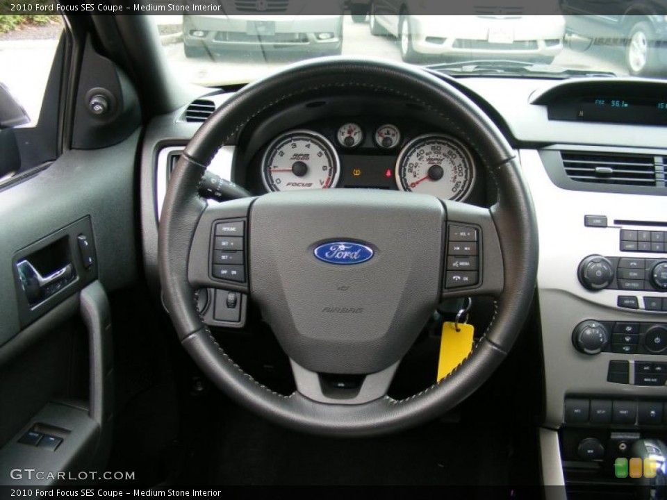 Medium Stone Interior Steering Wheel for the 2010 Ford Focus SES Coupe #40509870