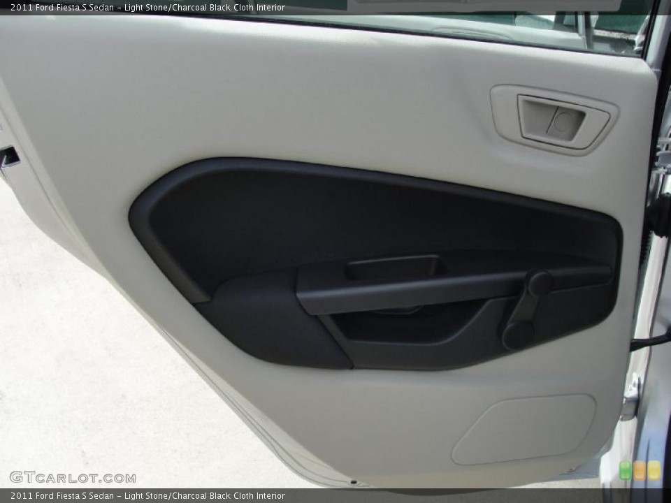Light Stone/Charcoal Black Cloth Interior Door Panel for the 2011 Ford Fiesta S Sedan #40542257